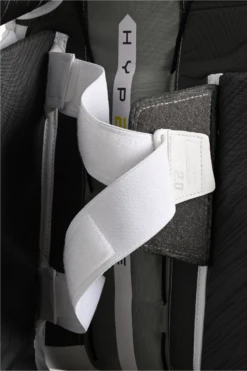 Bauer Vapor Hyperlite2 Senior Goalie Pads 17 Bauer Vapor Hyperlite2 Senior Goalie Pads -Hockey Boutique 1061658 BTH23 GOAL PADS HYP2RLITE SR WHITE Tune Fit Strap detail 02